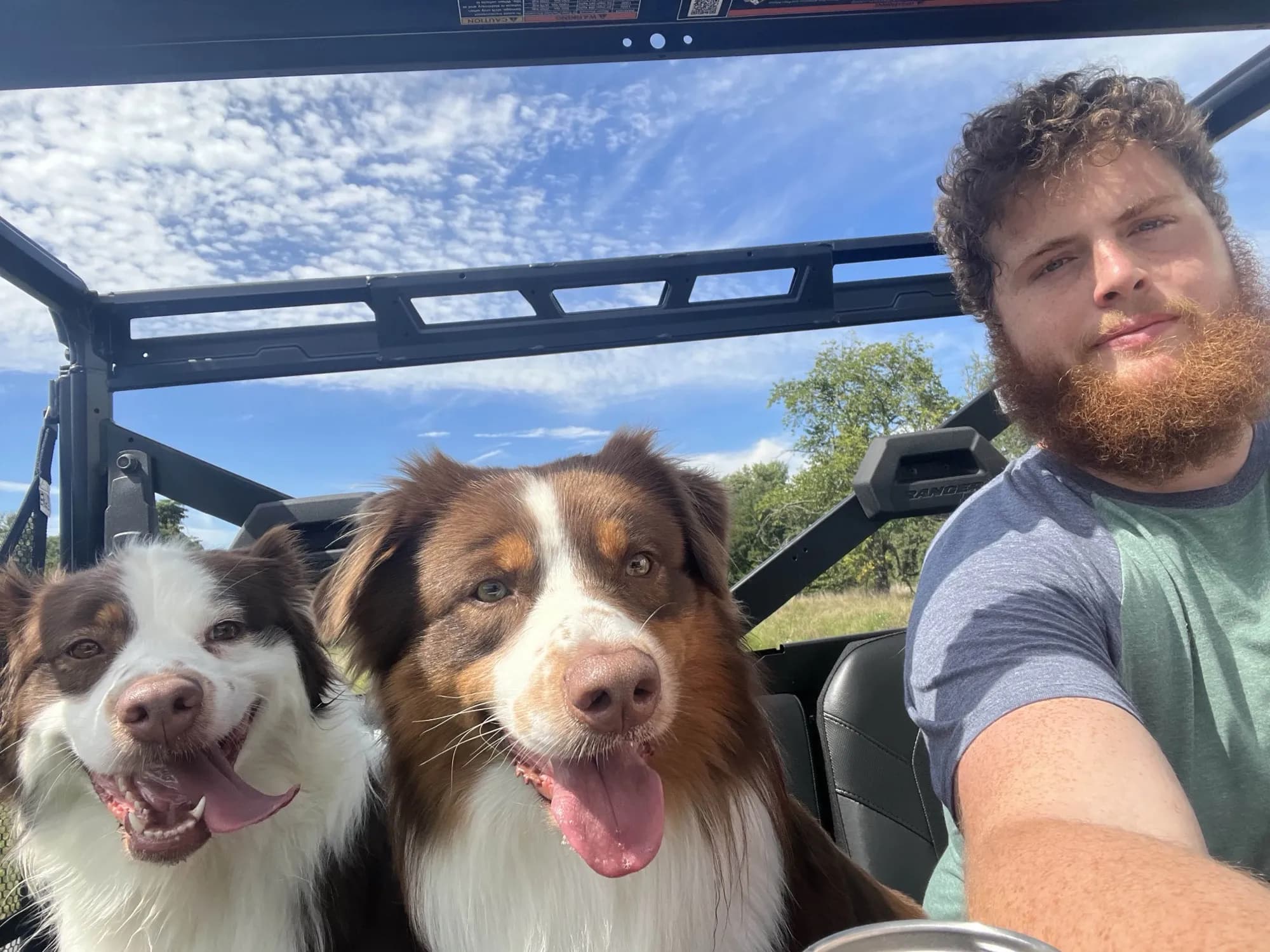 Aubrey and Marshal with Polaris, showing the multi-dog household environment our puppies grow up in