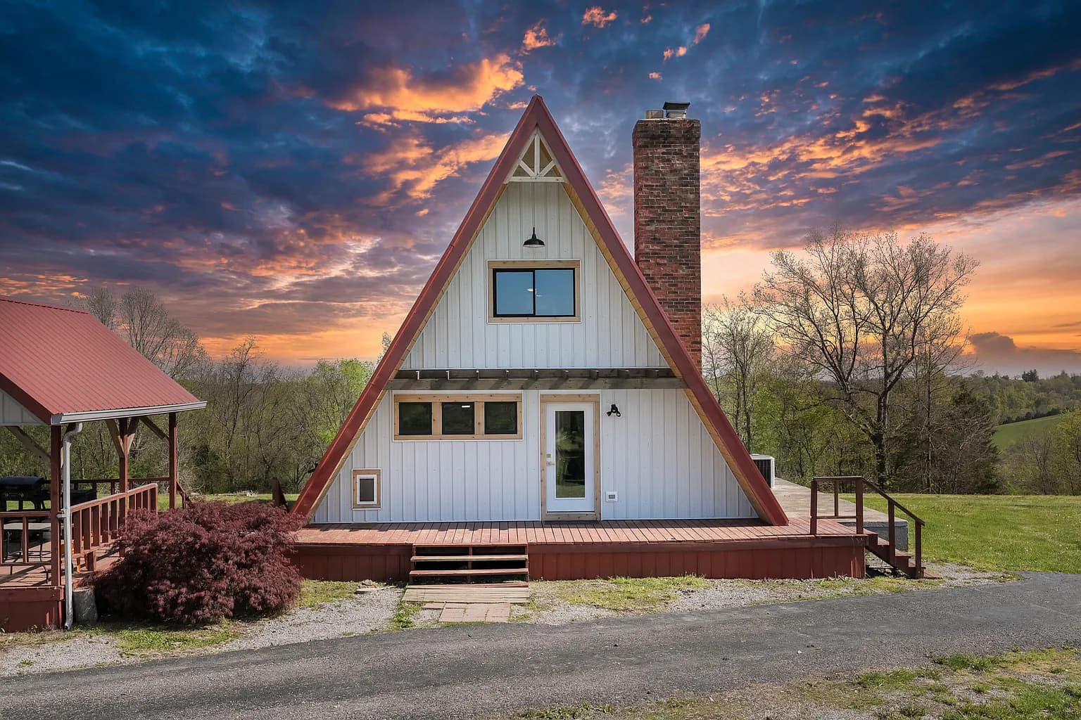 Queen City Farm A-frame farmhouse at sunset