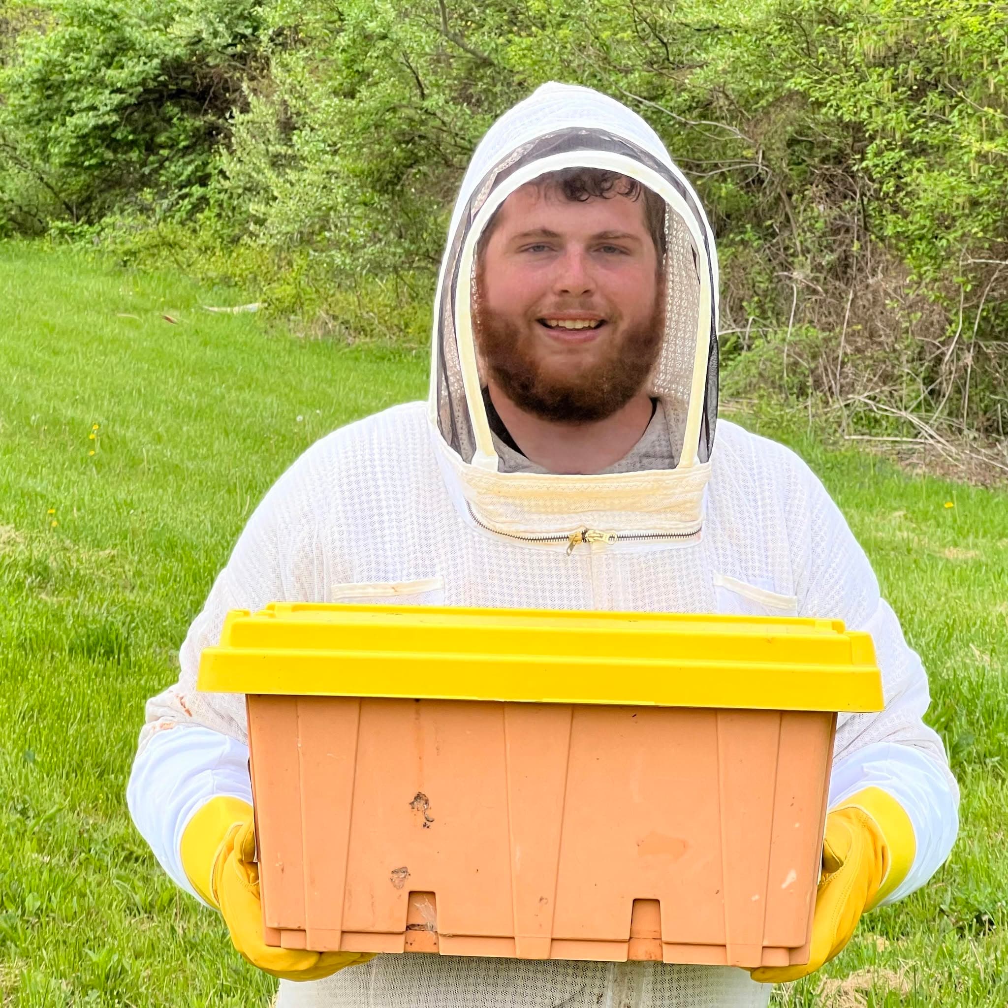 Samuel Curry on the farm at Queen City Farm